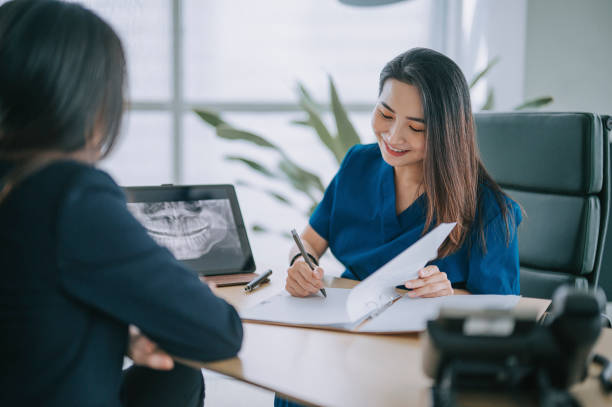 Dentist approving insurance